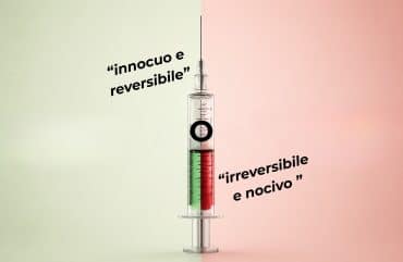 una siringa con parte del contenuto verse (reversibile e innocuo) e parte del farmaco rosso (irreversibile e nocivo)